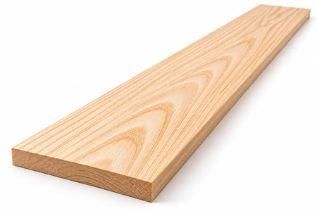 Smoothly planed Swamp Ash thin lumber board with light tan wood tone and distinctive arching grain patterns, isolated against a white background.